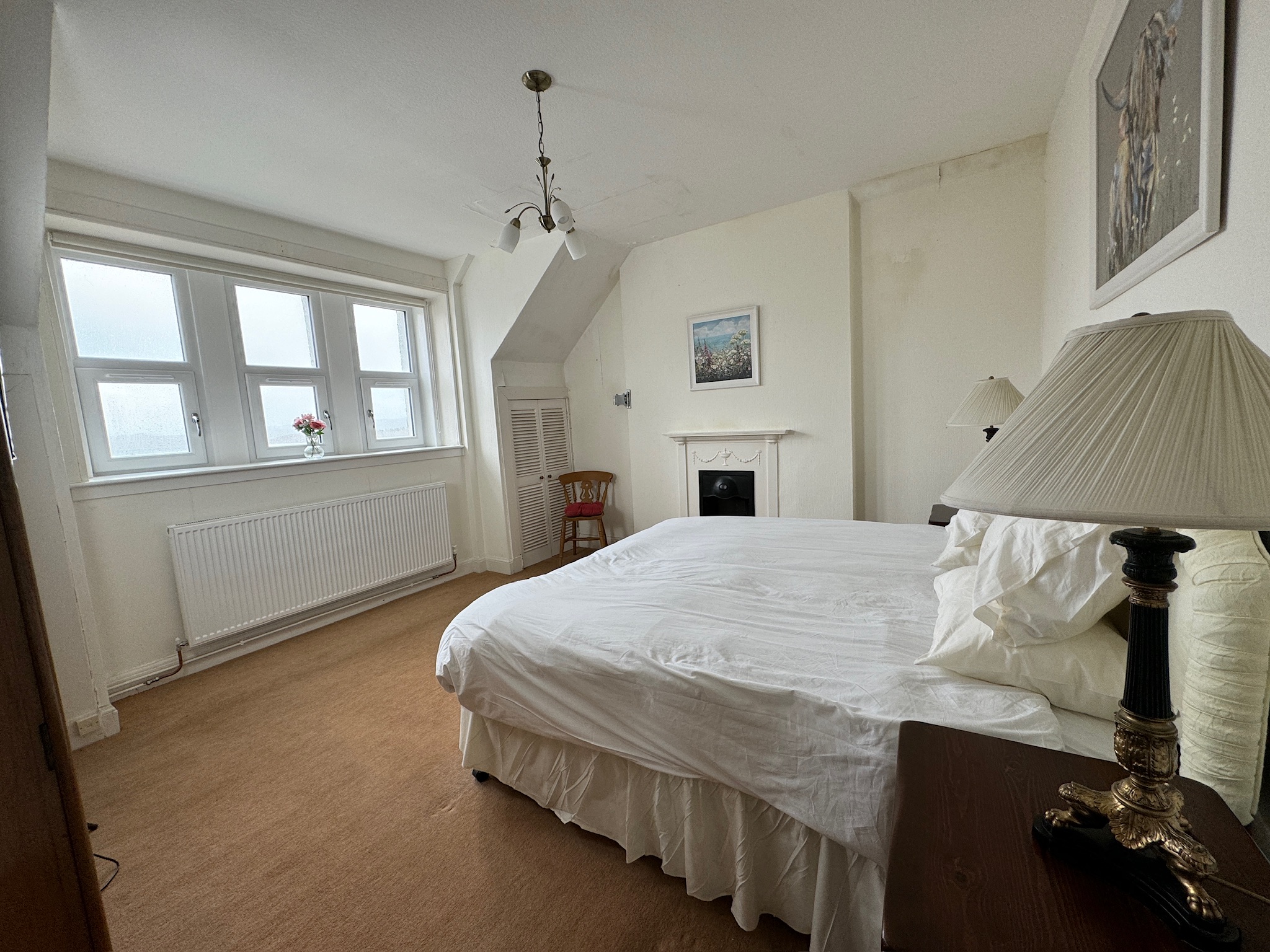 Bright bedroom with picture window